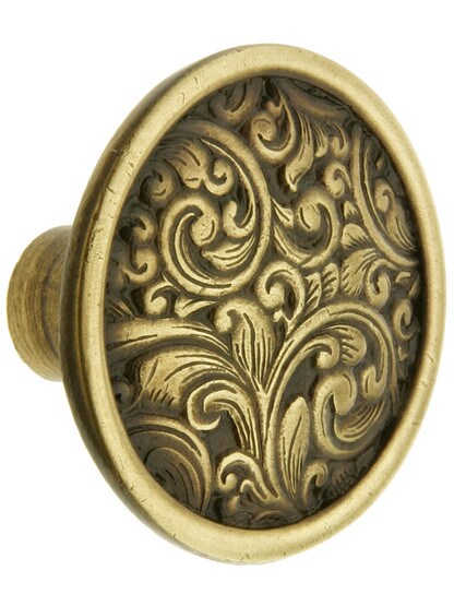 Saddleworth Cabinet Knob - 1 3/8 inch Diameter in Antique Brass.
